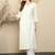 White ethnic motifs  embroidered straight kurtas