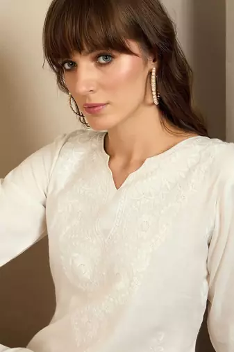 White ethnic motifs  embroidered straight kurtas