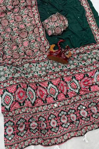 Green crepe embroidered saree with mirror work
