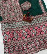 Green crepe embroidered saree with mirror work