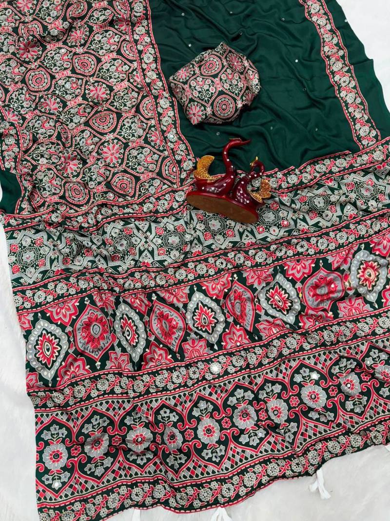 Green crepe embroidered saree with mirror work
