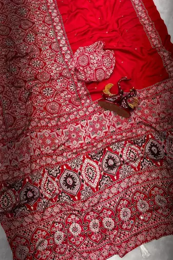 Red crepe embroidered saree with mirror work
