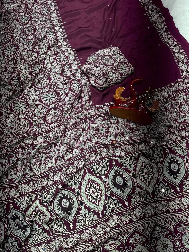 Wine crepe embroidered saree with mirror work