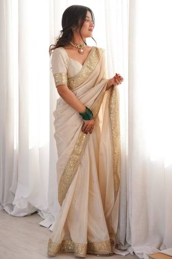 Cream silk blend embroidered saree with sequins work