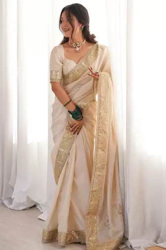 Cream silk blend embroidered saree with sequins work
