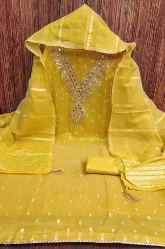 Yellow color designer simmer butti fabric ceremonial partywear suit
