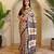 Beige viscose printed saree with zari work