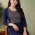 Blue women ethnic motifs embroidered thread work kurta