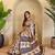 Beige viscose printed saree with zari work
