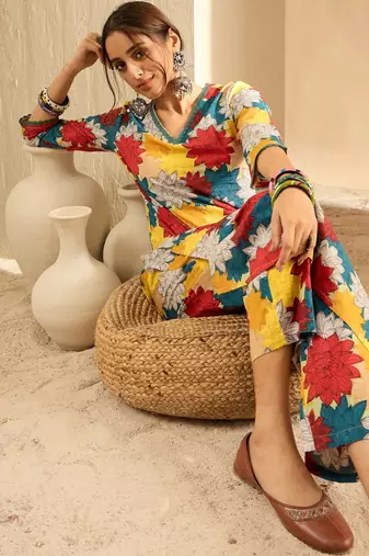 Yellow women floral printed regular pure cotton kurta with trousers