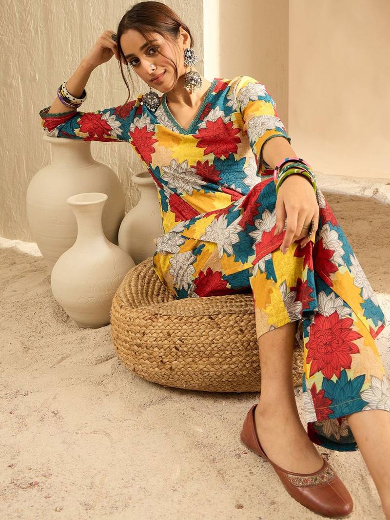 Yellow women floral printed regular pure cotton kurta with trousers