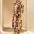 Yellow women floral printed regular pure cotton kurta with trousers