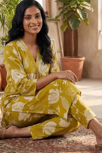 Yellow women floral printed regular pure cotton kurta with trousers