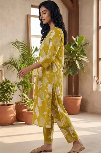 Yellow women floral printed regular pure cotton kurta with trousers