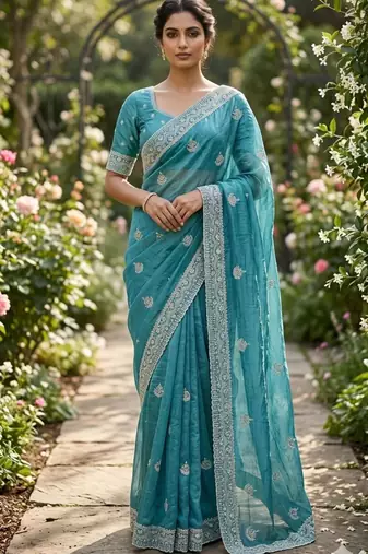 Sea green cotton silk embroidered saree with sequins work