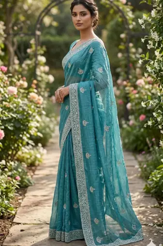 Sea green cotton silk embroidered saree with sequins work
