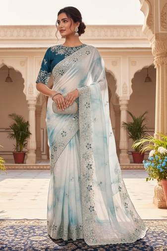Teal silk blend embroidered saree with tie dye