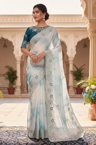 Teal silk blend embroidered saree with tie dye