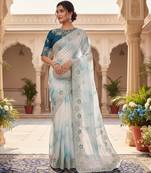 Teal silk blend embroidered saree with tie dye