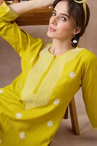 Yellow women ethnic motifs embroidered thread work kurta
