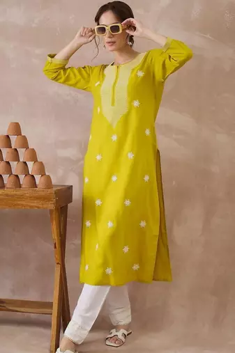 Yellow women ethnic motifs embroidered thread work kurta