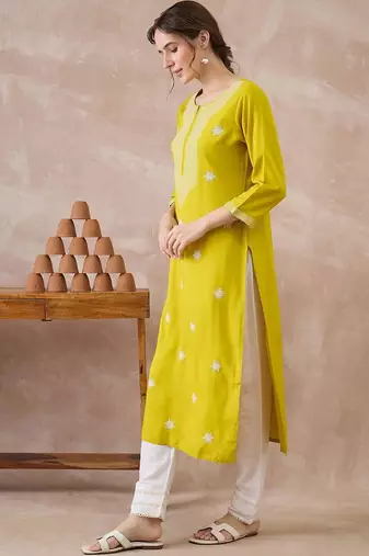 Yellow women ethnic motifs embroidered thread work kurta