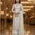 White color girlie butterfly net ceremonial salwar kameez for glamorous looks