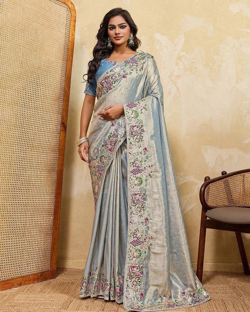Sky blue soft silk blend saree with beads embroidery border