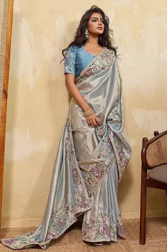 Sky blue soft silk blend saree with beads embroidery border