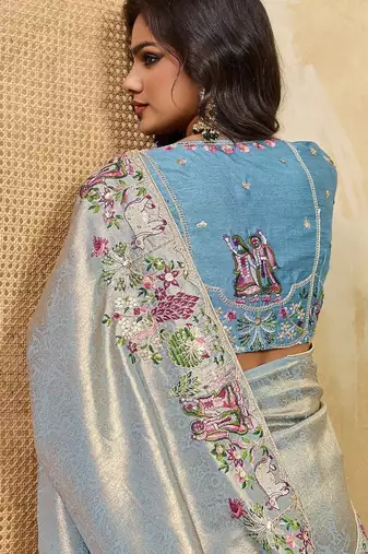 Sky blue soft silk blend saree with beads embroidery border
