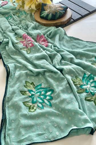 Sea green georgette printed saree with floral print