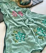 Sea green georgette printed saree with floral print
