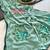 Sea green georgette printed saree with floral print