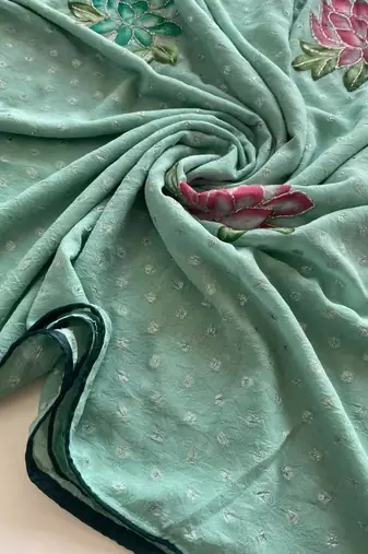 Sea green georgette printed saree with floral print