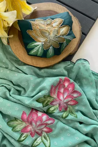 Sea green georgette printed saree with floral print
