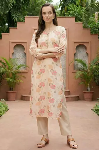 Cream women floral printed thread work floral kurta