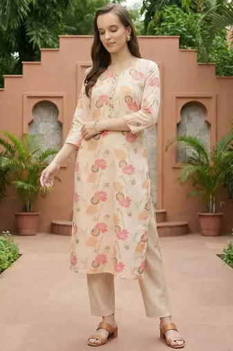 Cream women floral printed thread work floral kurta