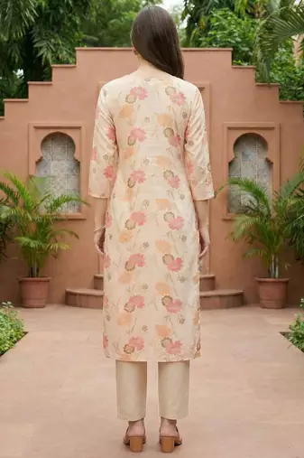 Cream women floral printed thread work floral kurta