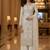 White color girlie butterfly net ceremonial salwar kameez for glamorous looks