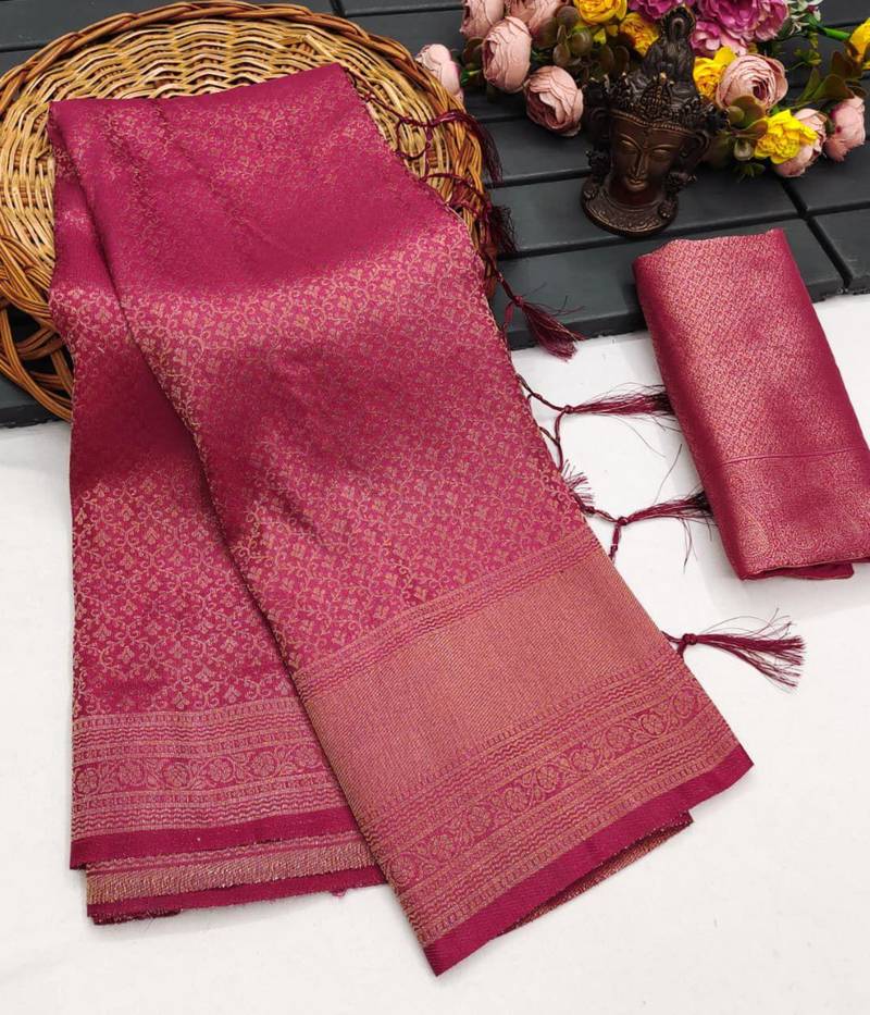 Pink silk blend woven saree with zari work