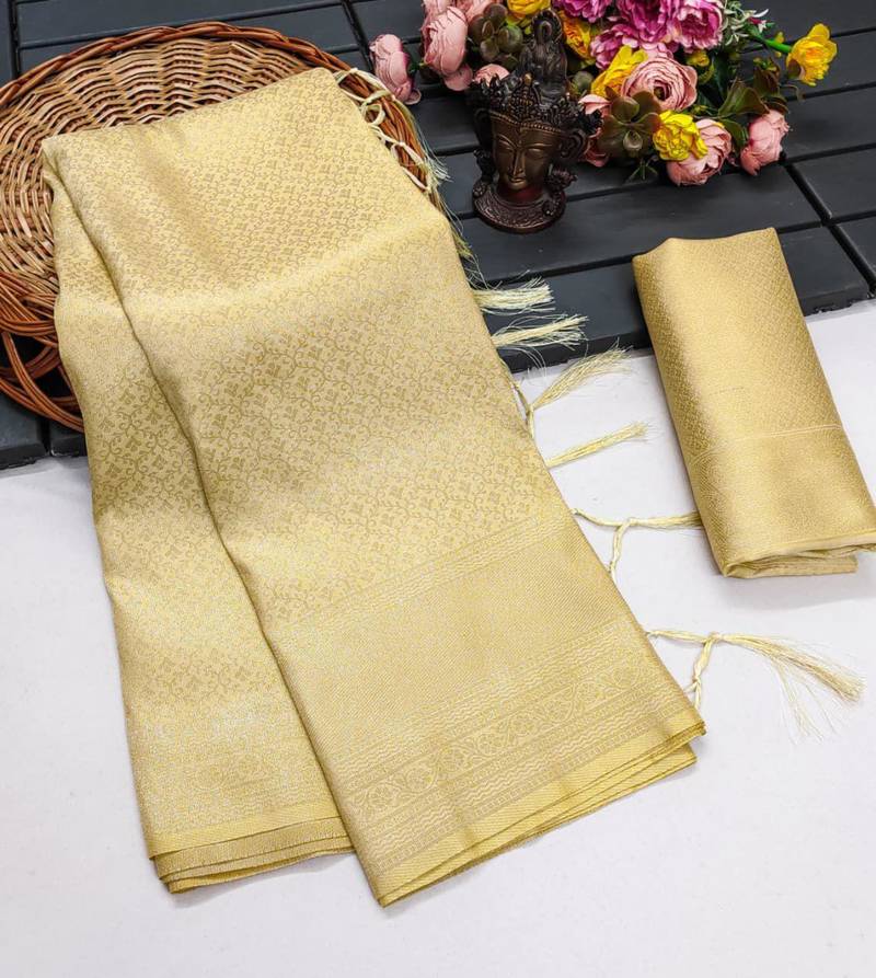 Beige silk blend woven saree with zari work