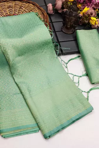 Sea green silk blend woven saree with zari work