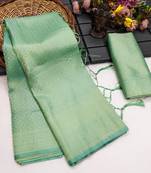 Sea green silk blend woven saree with zari work