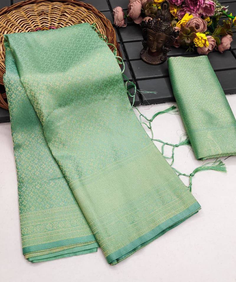 Sea green silk blend woven saree with zari work
