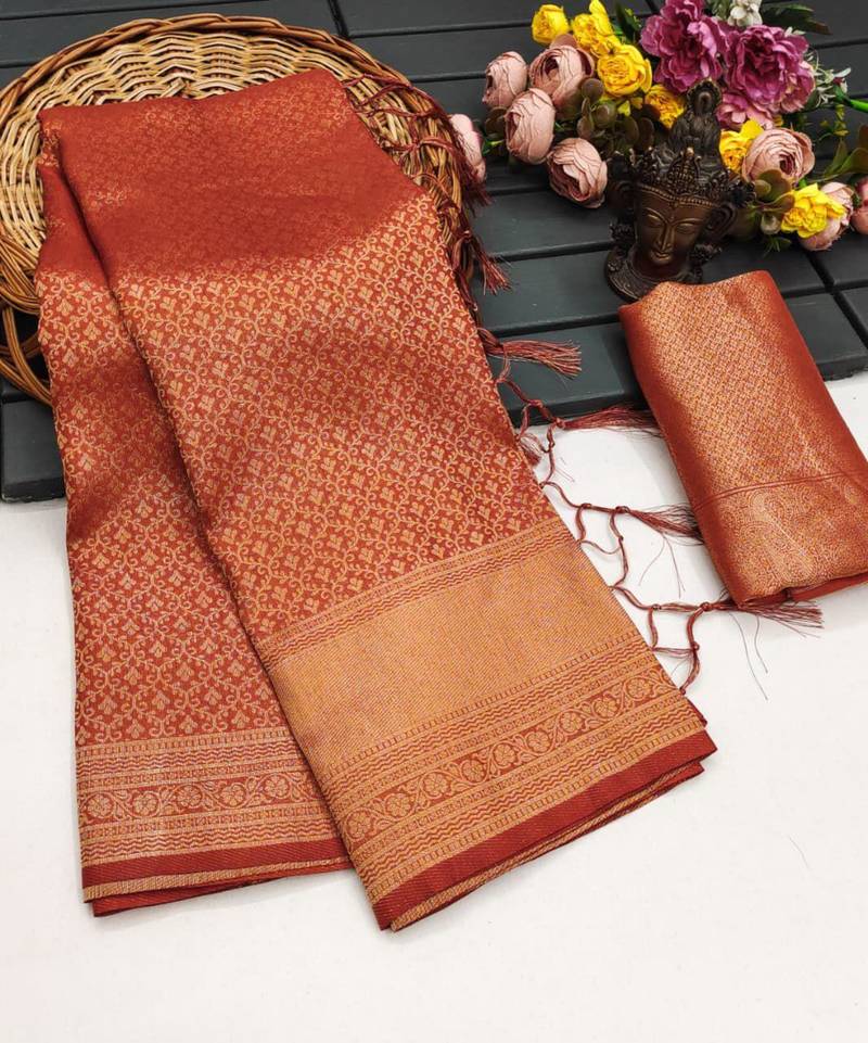 Orange silk blend woven saree with zari work