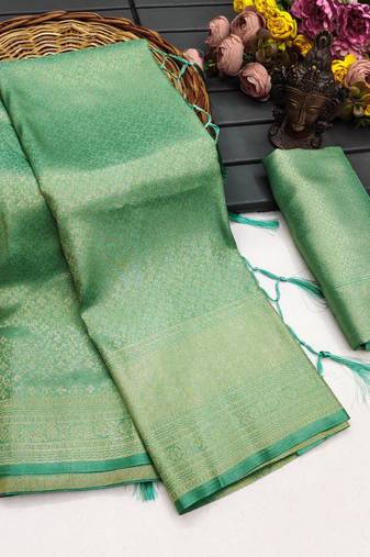 Sea green silk blend woven saree with zari work