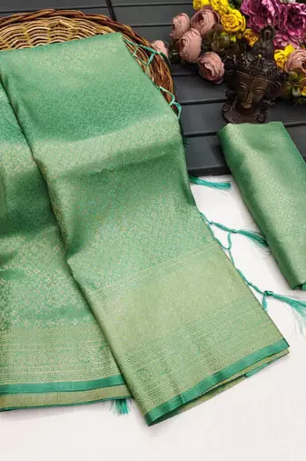 Sea green silk blend woven saree with zari work