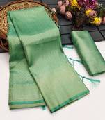 Sea green silk blend woven saree with zari work