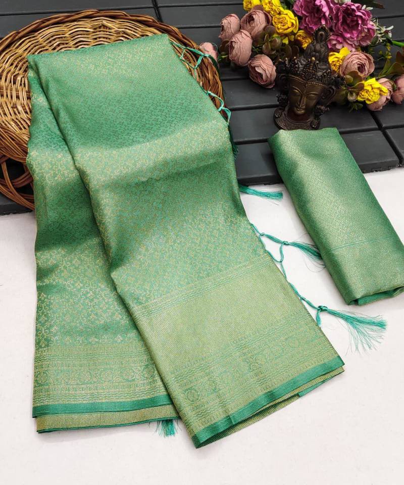 Sea green silk blend woven saree with zari work