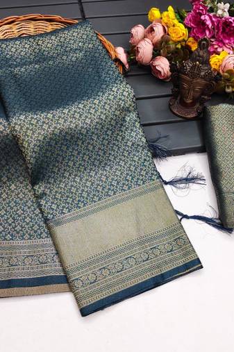 Teal silk blend woven saree with zari work